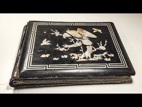 Restoration of an antique photo album: an unexpected find...