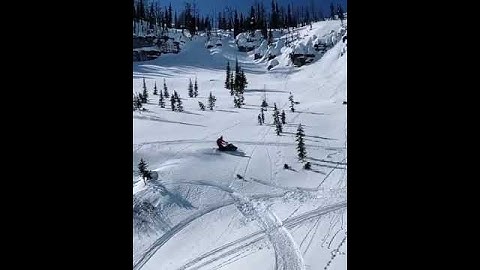 Guy Crashes Into Tree While Riding Snowmobile - 1110687