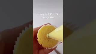 Filling a cupcake with Wilton tip 230 #cupcake #cupcakefilling #fillacupcake #cupcakedecorating