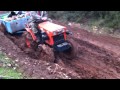 Kubota B7001 4x4 in way through a lot of mud!!! INCREDIBLE !!!