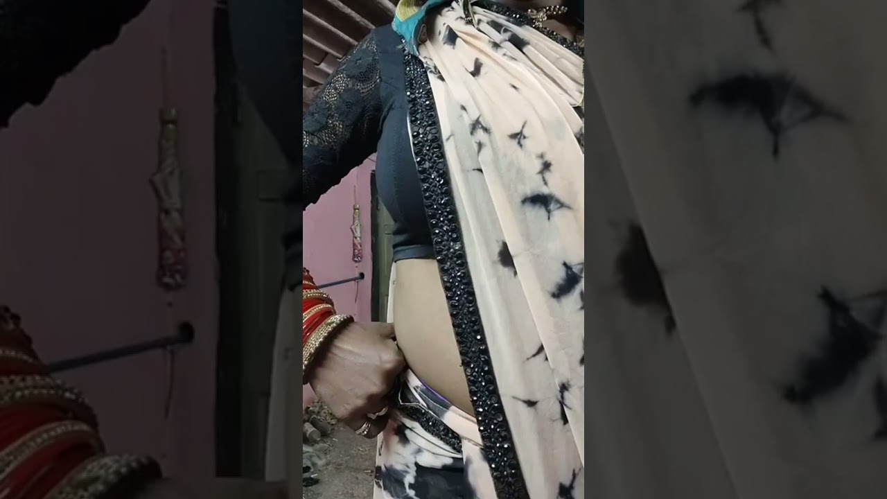 Crossdresser wearing saree with blouse 