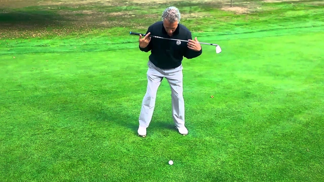 golf swing basics driver WHGC Golf Lesson - Hitting From a Downhill Lie