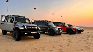 Two Jeep Wranglers, a Landcruiser and a Pajero dune bashing
