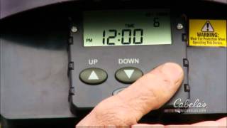 Moultrie Pro Hunter 30 gal breakdown tripod feeder.wmv