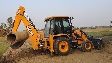 JCB Backhoe Machine Making Drain and installing Culvert Pipe - JCB Road Construction Video