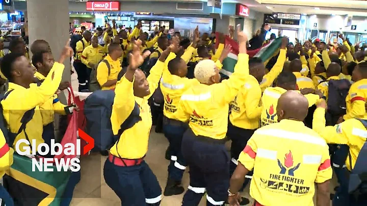 Firefighters from South Africa break into song and dance as they arrive in Alberta to help