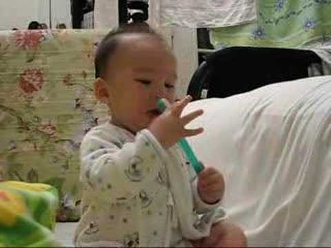 Baby Timothy brush his own teeth - 2
