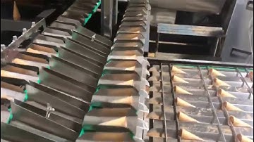 Automatic rolled sugar cone/waffle cone/ice cream cup machine with sleeving