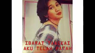 Nike Ardilla - Dermaga Cinta (Official Video Lyrics)