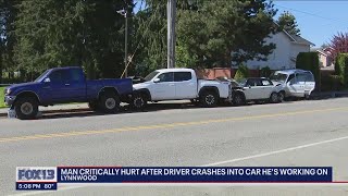 Man critically injured after getting hit by a car while working on his own | FOX 13 Seattle