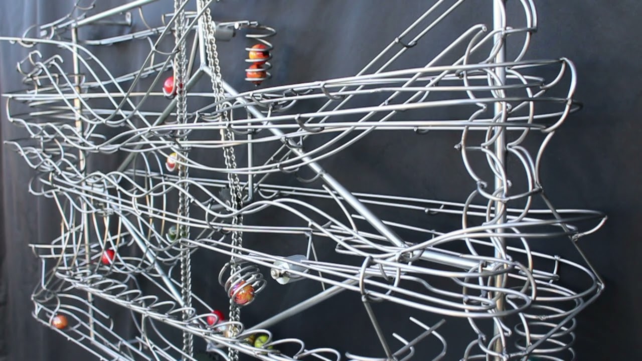 Matthew Gaulden Rolling Ball Sculpture - Wall Mounted 