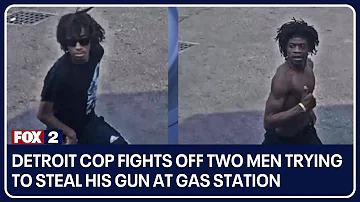 Detroit cop fights off two men trying to steal his gun at gas station