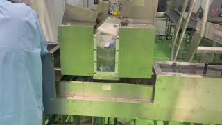Two automatic sorting machines with a box machine automatic full system snack ,food ,milk package