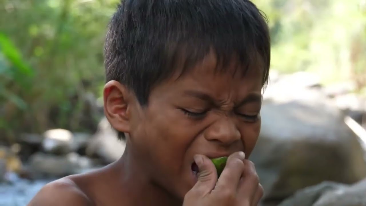 Smart boy cooking chicken wing