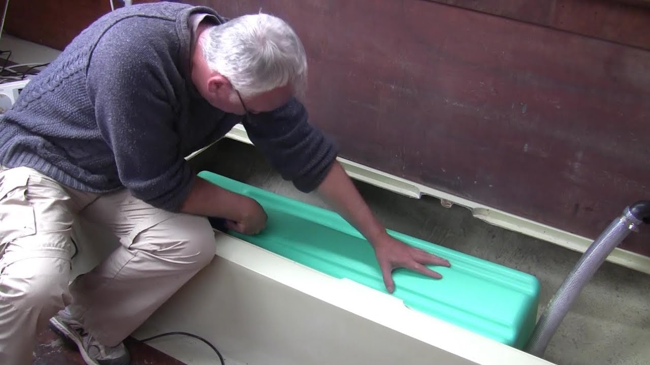 Just About Sailing August 2018 - Checking for leaks in the rain, stern anchor locker, new water tank