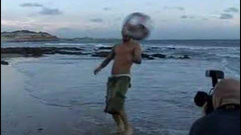 Watch a half-naked David Beckham show off on the beach!