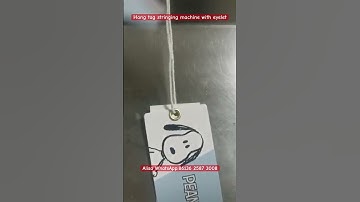 Hang tag stringing machine for eyelets