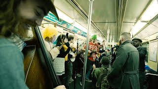 Band Perform Queen On NYC Subway