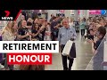 Retiring Kmart doorman honoured by locals | 7 News Australia