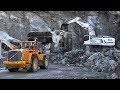 Liebherr r966  volvo l350f working on metso crushers in quarry