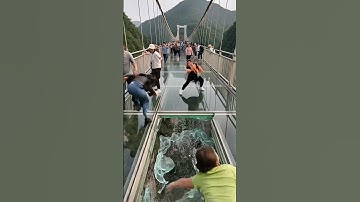 Thumbnail of Glass bridge cracks and collapses.