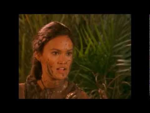 Sydney Fox (Tia Carrere) mud fight followed by a quick shower