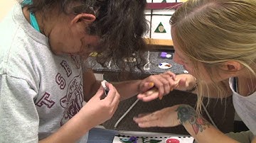 Tania Builds Daily Calendar Using Tactile Symbols