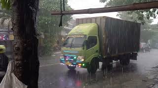 Heavy rain poured down the highway which was busy with vehicles #rainsounds