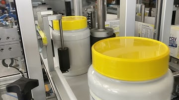 Labelling system for big plastic jars for energy drinks