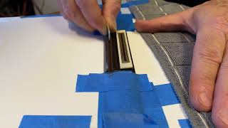Manuel Reyes flamenco Guitar Repairing the Saddle intonation .