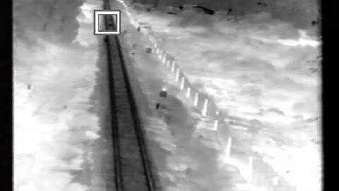 VMD -  Man crawl near railroad, Thermal