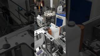 Автоматическая этикетировочная линия АЭ-5 с системой трехсторонней этикетировки канистр.
