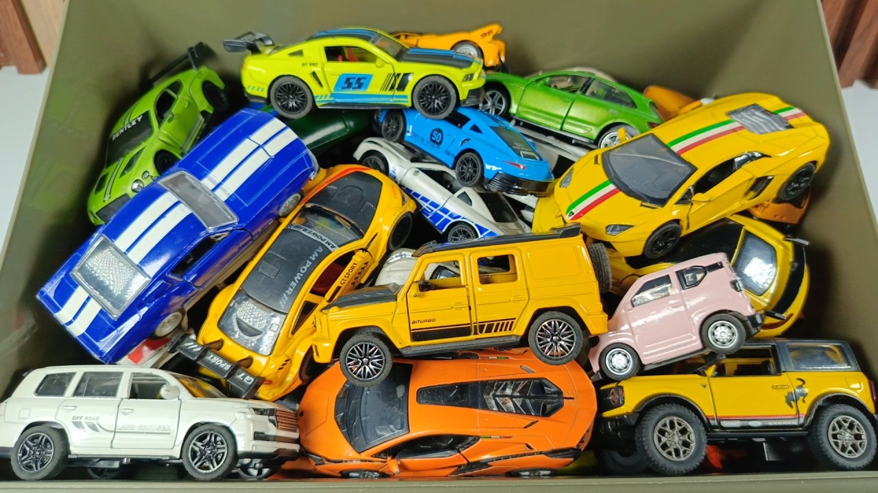 Vamos a elegir coches a escala diecast Cadillac Escalade, Jeep Grand Cherokee, Subaru WRX, Supra MK4