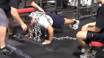 Dan doing a crazy amount of push ups w/ and without chains