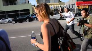 Miley Cyrus snarks on Paparazzo