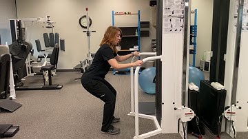 Physical Therapist Shows Proper Squat Form