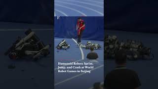 Humanoid Robots Sprint, Jump, and Crash at World Robot Games in Beijing | Firstpost News