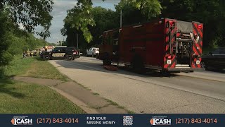 Emergency responders extricate man from car at crash site on U. S. Route 150