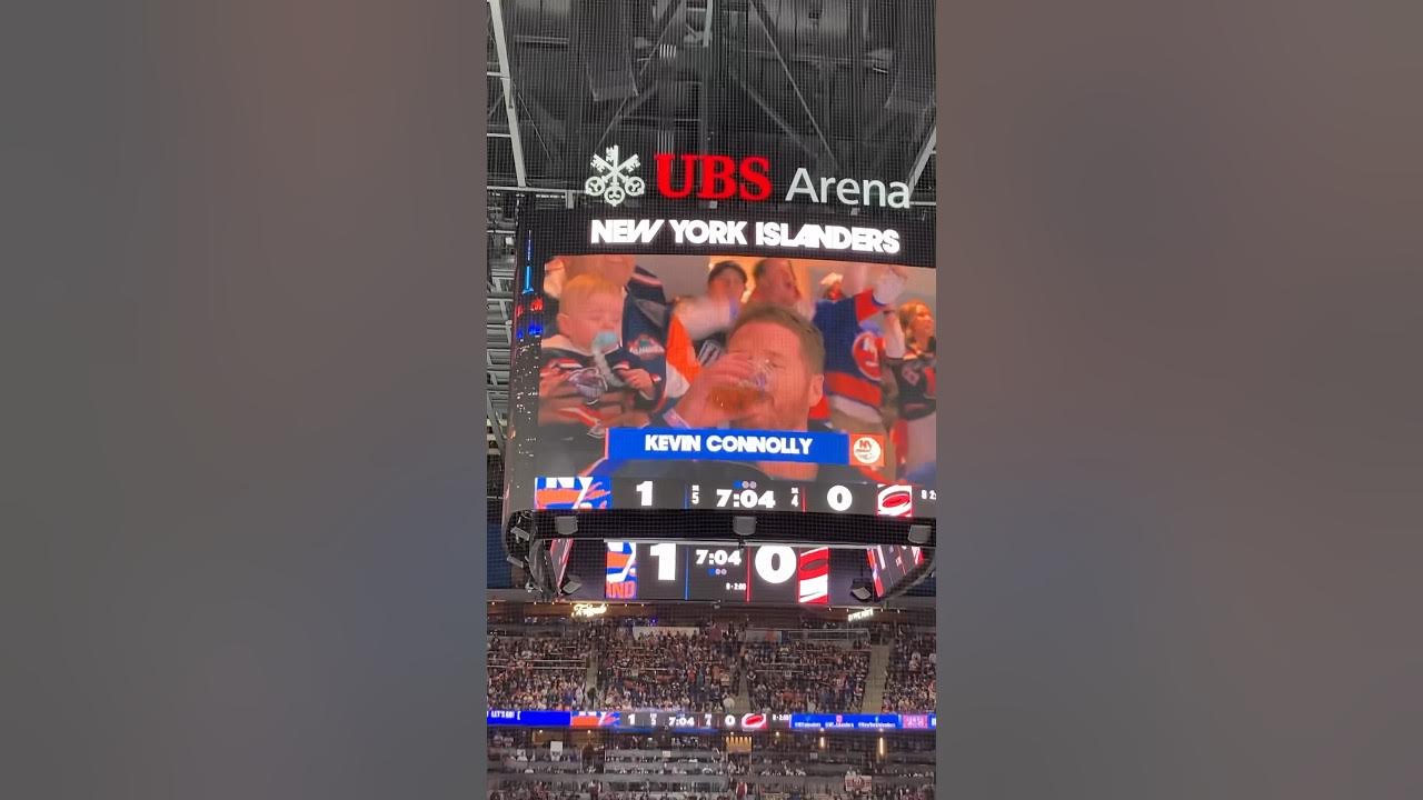 Actor Kevin Connolly chugging a beer at the Isles vs Canes Playoff Game