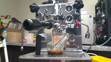 E61 group brewing shot with pre-infusion