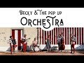 Becky  the pop up orchestra comes love