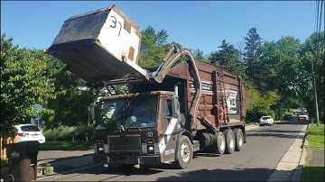 Whitetail Disposal:Mack LE McNeilus Century Atlantic curotto can garbage truck