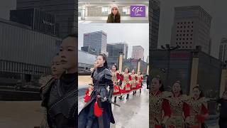 A Solemn Parade In Traditional Attire