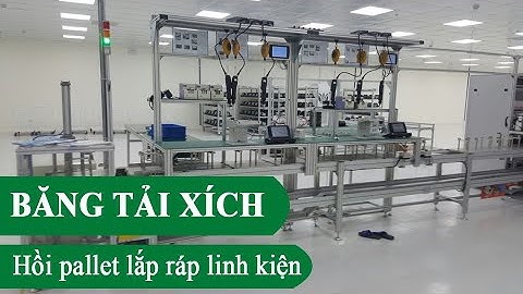 Băng tải xích hồi pallet vận chuyển, lắp ráp linh kiện ô tô.