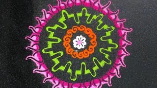Colorful Rangoli design using finger and bud