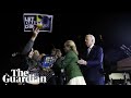 Protesters rush stage as Joe Biden makes Super Tuesday speech