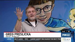 Student-inspired mural comes to life in Green Bay school library