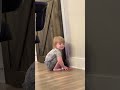 Pooping baby in corner