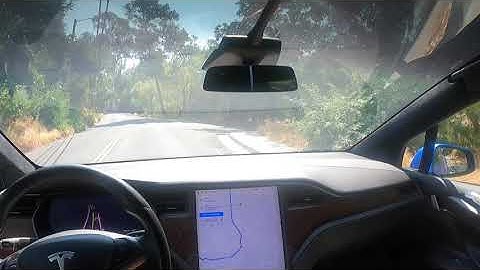 [FSD Beta 9.2] handles unprotected left turn and mountainous roads like a champ