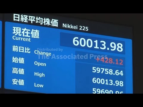 Japan's Nikkei stock index tops 60,000, but Asian stocks retreat after initial jump